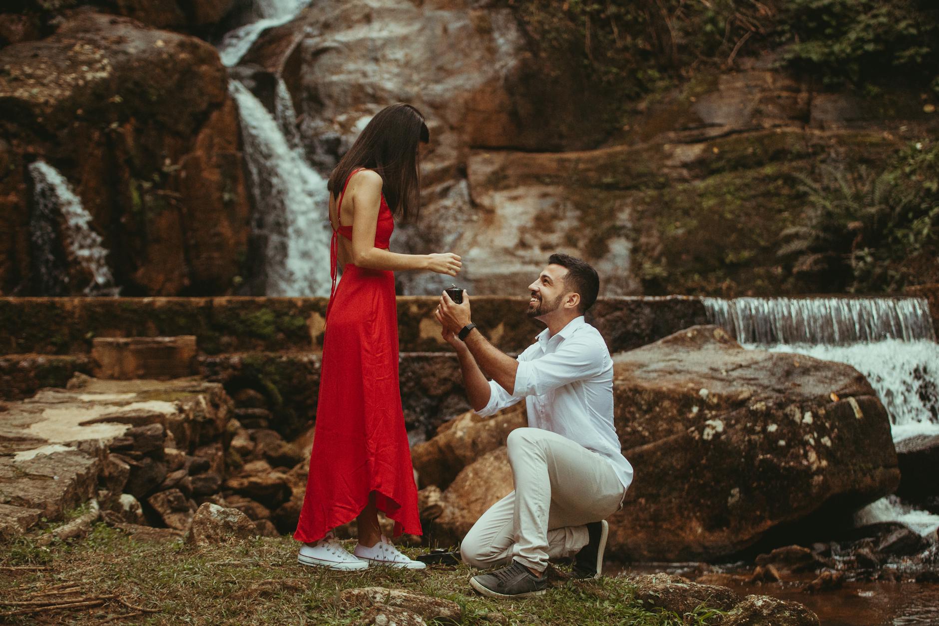 A couple walking through nature, relaxed and connected