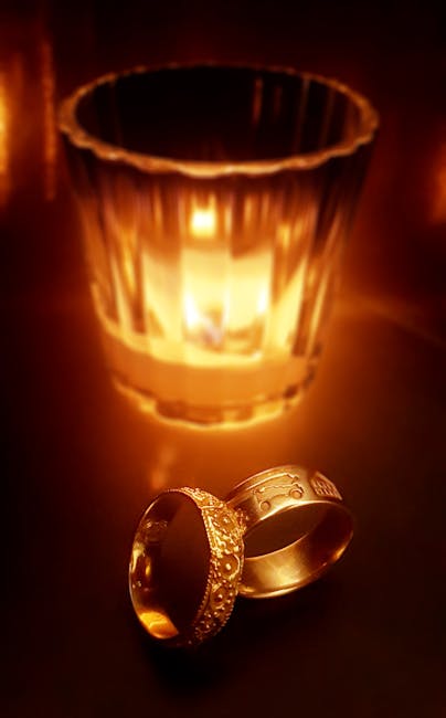 An intimate indoor ceremony space lit by soft candlelight